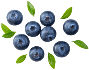 scattered arrangement of fresh, ripe blueberries with vibrant green leaves