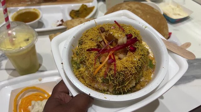 Raj Kachori, a special Gujarati dish served with chana bhatura and dosa