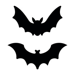 Two silhouetted bats in flight against a white background