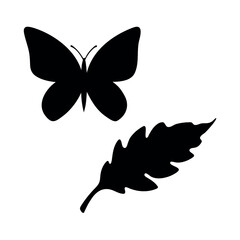 Black silhouette of a butterfly and an oak leaf on a white background