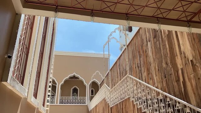 Wooden Zamindar Badi with stairs and Bengali architecture made at a pandal in Kolkata