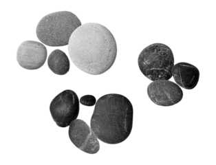 collection of smooth, rounded beach stones in various shades of gray and black