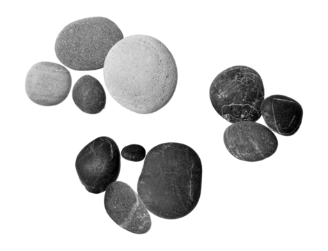 collection of smooth, rounded beach stones in various shades of gray and black