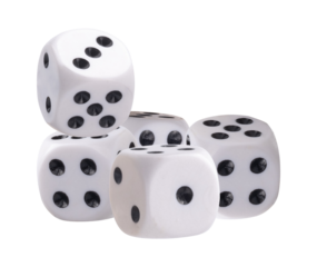 group of five white dice with black dots showing various numbers for games of chance