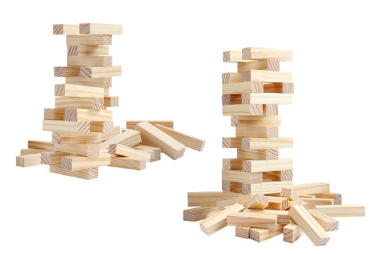 two tall stacks of wooden jenga blocks in a strategic game setup