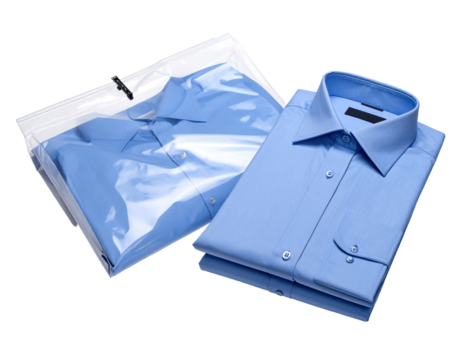 Two light-blue dress shirts, neatly folded, inside clear plastic garment bags