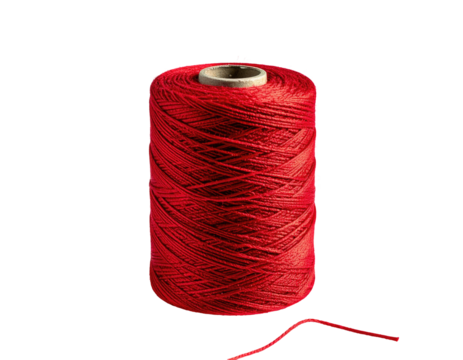 Red thread spool isolated against black background