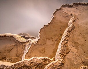 Nature's sculptural masterpiece of layered mineral formations, revealing intricate textures and unique patterns formed by geological processes under soft, ethereal light