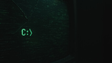 A captivating close-up of a vintage computer screen, displaying the iconic C:> prompt in a stark, nostalgic digital glow, evoking a sense of the technological past.
