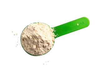 Measuring scoop of light beige powder