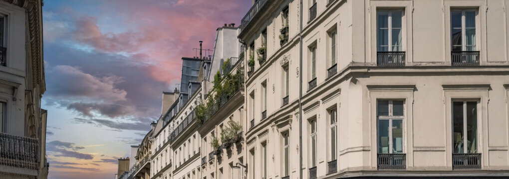 Paris, beautiful buildings boulevard Poissonniere, in a touristic district 
