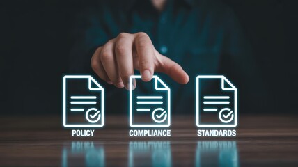 Hand selecting policy, compliance, and standards icons, ensuring business success and guidelines