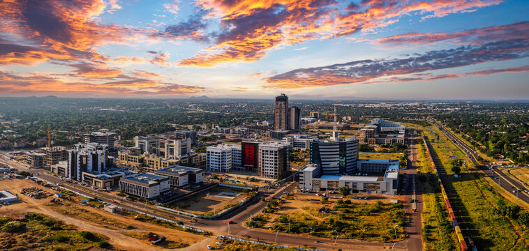aerial view Gaborone CBD central, city skyline at sunset, bustling central business district