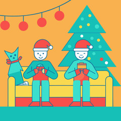Fototapeta premium Two cheerful figures in santa hats exchange gifts on a sofa next to a decorated christmas tree