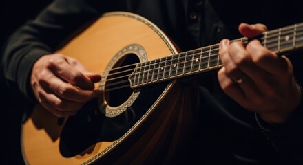 Close-up of hands playing bouzouki