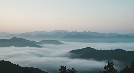 Fototapeta premium 朝霧が深く漂う谷間に広がる壮大な雲海が作り出す幻想的な風景 柔らかな早朝の光が幾重にも重なる山々の峰を優しく照らし静寂な絶景を鮮やかに彩る. AI Generated