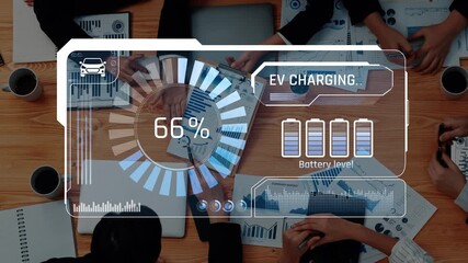 A modern workspace showcases a digital interface for electric vehicle charging with a battery level at 81percent. Teams collaborate on sustainable transportation solutions. Raster - Powered by Adobe