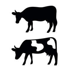 Two silhouetted cows one solid black and one spotted standing against a white background