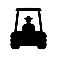 Silhouette of a person wearing a hat driving a golf cart from a front view