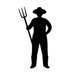 Silhouette of a farmer wearing a hat and holding a pitchfork standing confidently