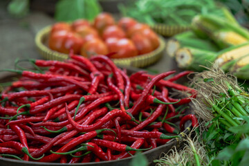 Vibrant chili peppers and fresh, colorful veggies showcase the richness of local markets beautifully