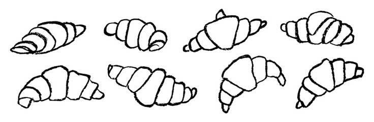 Set of croissants drawn by chalk. Black and white vector sketch of croissant with crayon texture  on white background.