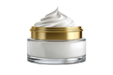A jar of cream with a gold rim sits on a white surface. The cream is whipped and has a smooth, creamy texture. The jar is clear and allows the cream to be seen through it