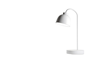 A white lamp is sitting on a table in front of a white wall. The lamp is turned on, and the light is shining on the wall. The room is empty, with no furniture or decorations