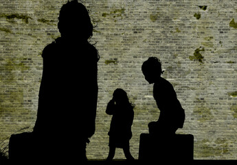 Refugee in Ukraine and Gaza and in the world showed as shadows on a wall with barbed wire