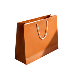 Paper shopping bag in orange with durable handles and smooth paper texture