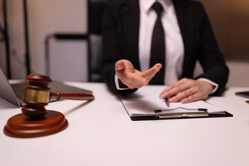 Lawyer businesswoman working diligently with signature document in a modern office, Signing...