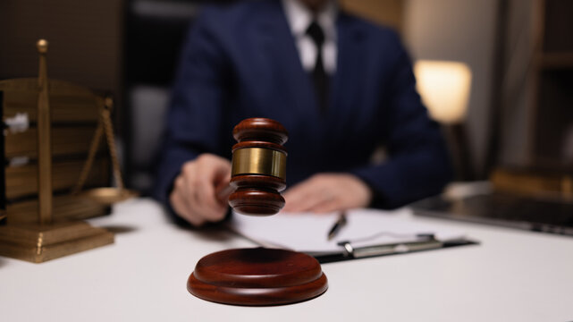 Female lawyer in office, Corporate lawyer at workspace, Attorney with legal books and gavel,