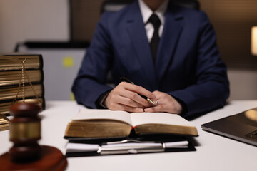 Female lawyer in office, Corporate lawyer at workspace, Attorney with legal books and gavel,