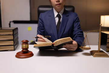 Female lawyer in office, Corporate lawyer at workspace, Attorney with legal books and gavel,