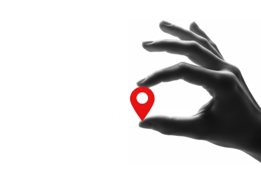 Hand holding a red gps location pin symbol