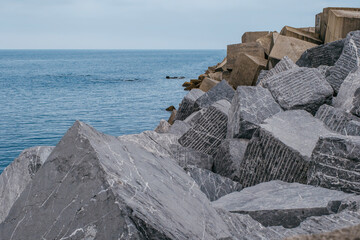 Breakwater Blocks For Coastal Protection Against Ocean Waves. Wave Dissipation, Erosion Control, Coastal Engineering, Harbor Defense, Infrastructure