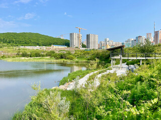 Park area around Lake Torfyanka in Patrokl Bay in Vladivostok in summer