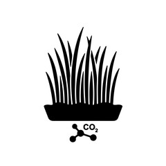A striking black and white icon showing a healthy cluster of seagrass blades standing tall and straight from the seabed. A small CO2 symbol is subtly incorporated