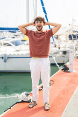 Young Arabian handsome man at outdoors with surprised expression