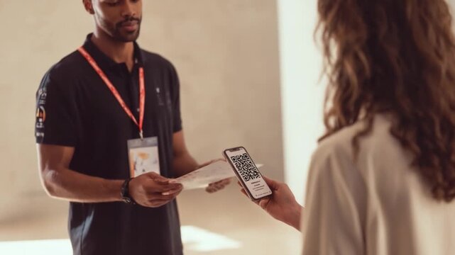 Digital Verification: A diligent individual, his gaze fixated on a mobile phone, performs a digital verification, symbolizing trust and assurance in modern interactions.
