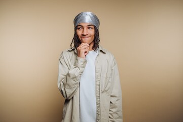 Thoughtful Young Person in Durag