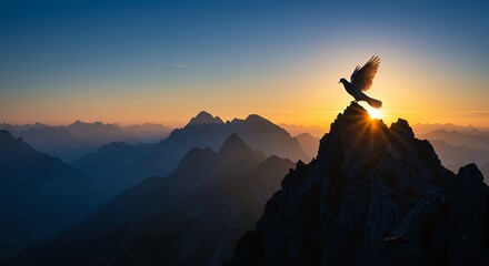 Silhouette of bird soaring above mountains against sunset sky dramatic nature scene