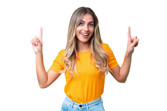Fototapeta Young Uruguayan woman over isolated background pointing up a great idea