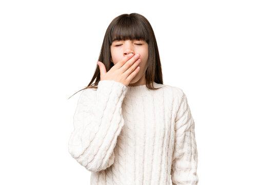 Little caucasian girl over isolated background yawning and covering wide open mouth with hand - Powered by Adobe