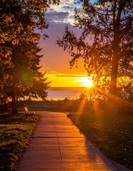 Autumn sunset path by the lake
