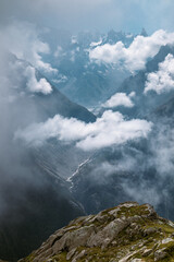 Mountain landscape in the Alps above the clouds