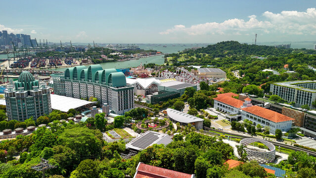 Panoramic aerial view of Sentosa Island from cable car with resorts and attractions below