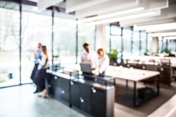Businessmen blur in the workplace in office with computer or shallow depth of focus of abstract...