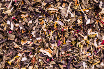 background mix of different varieties of tea with dried plant flowers for flavor. healthy flower tea. Boosting immunity, antioxidant. selective focus.