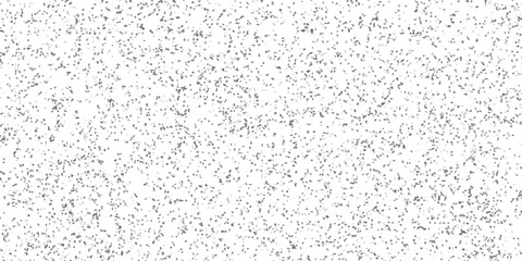 Obraz premium Subtle grayscale mosaic pattern with tiny irregular shapes creating a textured abstract background for design and digital art applications